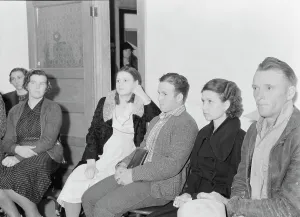 Borrowing Prints: Night meeting in the FSA office, Tulare County, California, 1938. Creator: Dorothea Lange