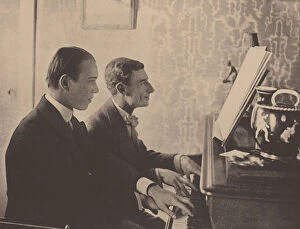 Diaghilev Collection: Nijinsky and Maurice Ravel at the piano playing a score from Daphnis and Chloe, 1912