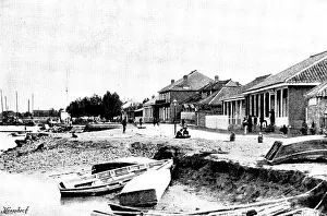 Chino Japanese War Of 1894 1895 Prints: Niuchuang; our only shops, river still open, 1895. Creator: George Meisenbach