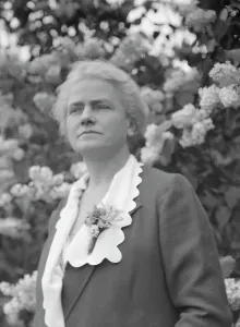 Portrait Photographs Prints: Noland, Charlotte, Miss, standing outdoors, 1931 May 8. Creator: Arnold Genthe