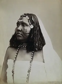 Healthcare Prints: A North African woman with scarification on her cheeks, c1900. Creator: Gabriel Lekegian