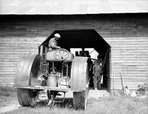 Tractor Prints: North Carolina threshing, 1936. Creator: Dorothea Lange
