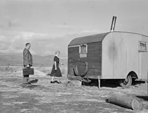 Nurse in FSA mobile camp unit conducts doctor... Merrill, Klamath County, Oregon, 1939. Creator: Dorothea Lange