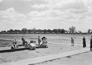 Nursery school children with their teacher, FSA camp, Tulare County, California, 1939. Creator: Dorothea Lange