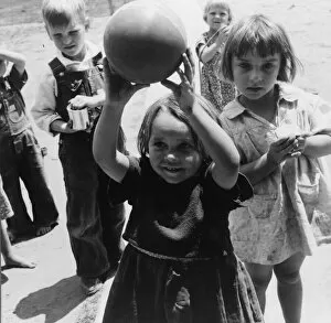 Nursery school, showing migrant children playing, FSA camp, Tulare County, 1939. Creator: Dorothea Lange