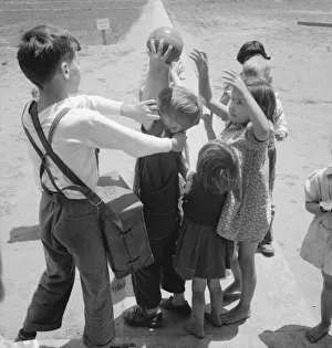 Nursery school, showing migrant children playing, FSA camp, Tulare County, CA, 1939. Creator: Dorothea Lange