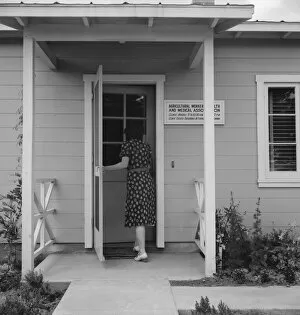 Healthcare Collection: Nurses help with sick baby, FSA camp, Farmersville, Tulare County, California, 1939