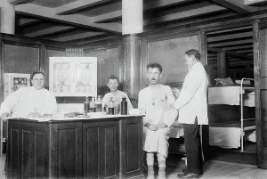 Photographglass Negative Prints: N.Y. City lodging house - vaccinating, 1914. Creator: Bain News Service