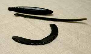 Stonework Prints: Obsidian Core, Blade, and Curved Neckpiece, c. A. D. 300. Creator: Unknown