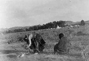 Face Paint Prints: Offering pipe to the skull-Cheyenne, c1910. Creator: Edward Sheriff Curtis