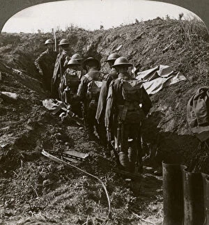 Images Dated 9th April 2009: Officer watching his men file into a dug-out to avoid a German strafe, World War I