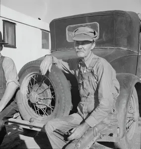 Oklahoman from Chickasaw in potato pickers camp, Kern County, California, 1937. Creator: Dorothea Lange