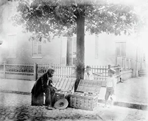 Strawberries Prints: Old African-American man selling strawberries on street