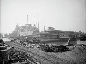 Disrepair Prints: Old boats beached to rot away, New York City, between 1900 and 1910. Creator: Unknown