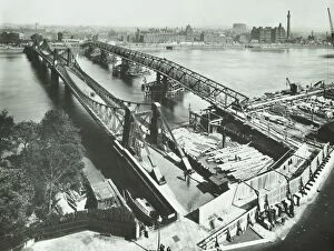Old Lambeth Bridge with temporary footbridge alongside, London, before 1932