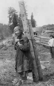 Carrying On Back Prints: Old Shoria Woman Collecting Wood; The Kumys Ulus, 1913. Creator: GI Ivanov