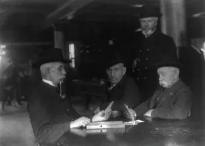 Old veterans playing cribbage at Soldiers Home, Washington, D.C. ca. 1900, c1900. Creator: Frances Benjamin Johnston