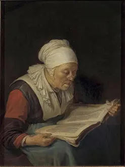 Elderly Woman Prints: Old Woman Reading a Book, 1665. Creator: Gerrit Dou