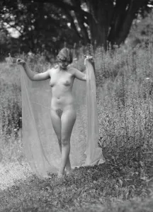 Olson, Margaret, Miss, standing outdoors, 1924 July. Creator: Arnold Genthe