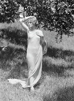 Portrait Photographs Prints: Olson, Margaret, Miss, standing outdoors, 1924 July. Creator: Arnold Genthe