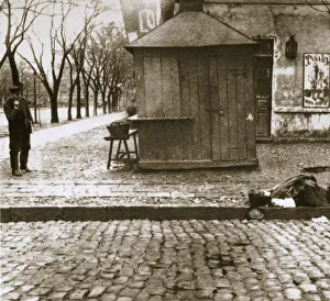 An onlooker observes a dead man left in the streets, Russia, early 20th century. Artist