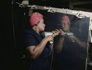 Headscarf Gallery: Operating a hand drill at Vultee-Nashville...working on a 'Vengeance'dive bomber, Tennessee, 1943