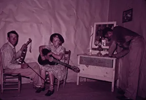 Guitar Gallery: Orchestra during intermission at square dance, McIntosh County, Oklahoma, 1939 or 1940