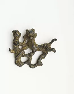 Bronze With Gilding Collection: Ornament in the form of a man with an animal, Han dynasty, 206 BCE-220 CE