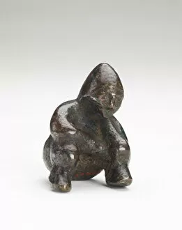 Republic Of China Gallery: Ornament in the form of a seated person, Possibly Han dynasty, 206 BCE-220 CE