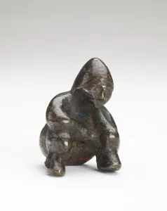 Ornament in the form of a seated person, Possibly Han dynasty, 206 BCE-220 CE Ornament in the form of a seated person, Possibly Han dynasty, 206 BCE-220 CE