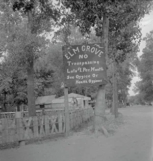 Sanitation Prints: On the outskirts of a modern Oklahoma City within sight of its gleaming skyscrapers