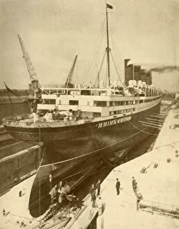 Liner Gallery: Overhauling a Large Liner in a Graving Dock at Liverpool, c1930. Creator: Unknown