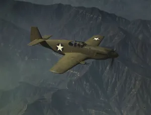 War Industry Prints: P-51 Mustang'fighter in flight, Inglewood, Calif. 1942. Creator: Alfred T Palmer