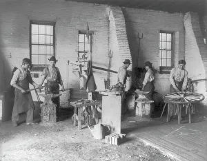 Wheelwright Prints: Pa. - Carlisle Indian School - student wheelwrights working in shop