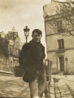 Montmartre Prints: Pablo Picasso at the place Ravignan, Montmartre, 1904. Creator: Anonymous