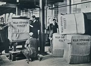 Bale Gallery: Packing the bales of khaki for despatch to the Government, c1914