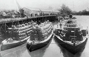 Paddle Steamers Prints: Paddle steamers and barges carrying wool bales - unknown location. Creator: Unknown
