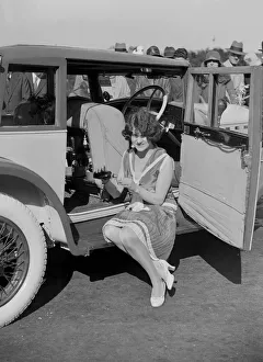 Ballot Gallery: Paddy Naismith pouring a drink from the cocktail bar in her Ballot at the Southport Rally, 1928