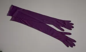 Pair of arm length purple gloves from Maes Millinery Shop, 1941-1994