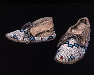 Sioux Gallery: Pair of childs moccasins, Plains, possibly Sioux, c. 1885. Creator: Unknown