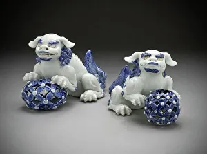 Pair of Okimono in the Form of Chinese Lions on Pierced Balls, 19th century. Creator: Unknown