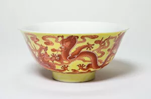 Qianlong Period Gallery: One of a Pair of Yellow and Iron-Red Dragon Bowls, Qing dynasty