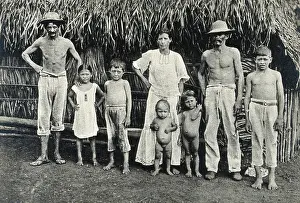 Panama Indian family outside a traditional hut, 1900/1910. Creator: Unknown
