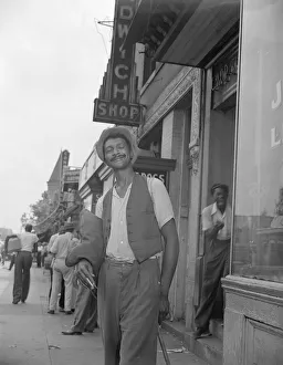 Gordon Roger Alexander Buchanan Parks Prints: Panhandler on 7th Street, N. W. Washington, D. C. 1942. Creator: Gordon Parks