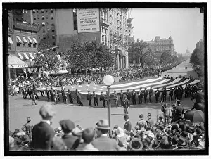 Parade On Pennsylvania Ave - Huge Flag, between 1910 and 1921. Creator: Harris & Ewing. Parade On Pennsylvania Ave - Huge Flag, between 1910 and 1921. Creator: Harris & Ewing