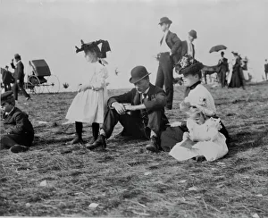 St Paul Minnesota United States Prints: Parents and children seated on grass at state fair