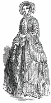 Paris Fashions for June - Promenade Dress, 1850. Creator: Unknown