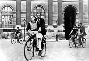 Restriction Gallery: Parisians travelling by bicycle, German-occupied Paris, July 1940