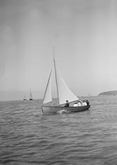 Party sailing on the Earl of Normantons Cutter, 1911. Creator: Kirk & Sons of Cowes