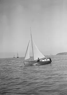 Dinghy Collection: Party sailing on the Earl of Normantons Cutter, 1911. Creator: Kirk & Sons of Cowes